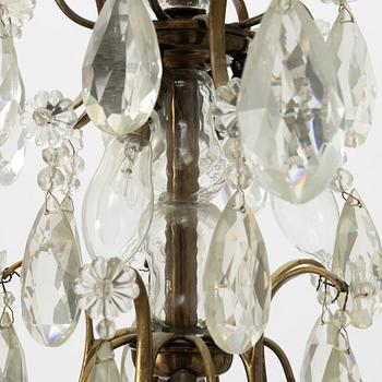 A Rococo style chandelier, early 20th century.