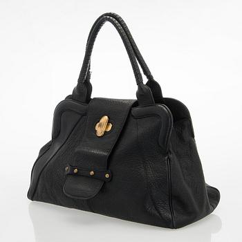 Max Mara, a leather handbag.