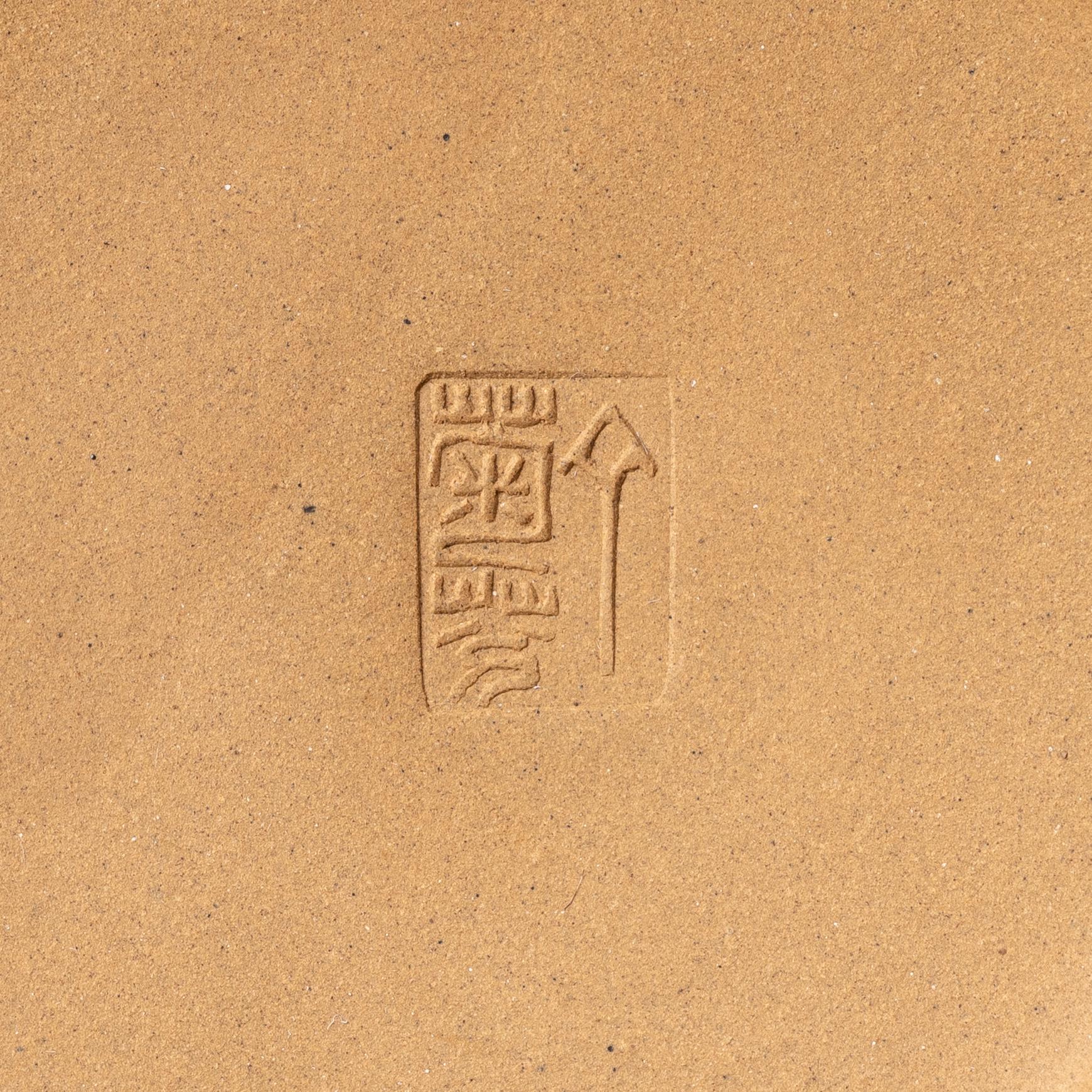 A group of three yixing teapots and a box with cover, China, 1970/80s.