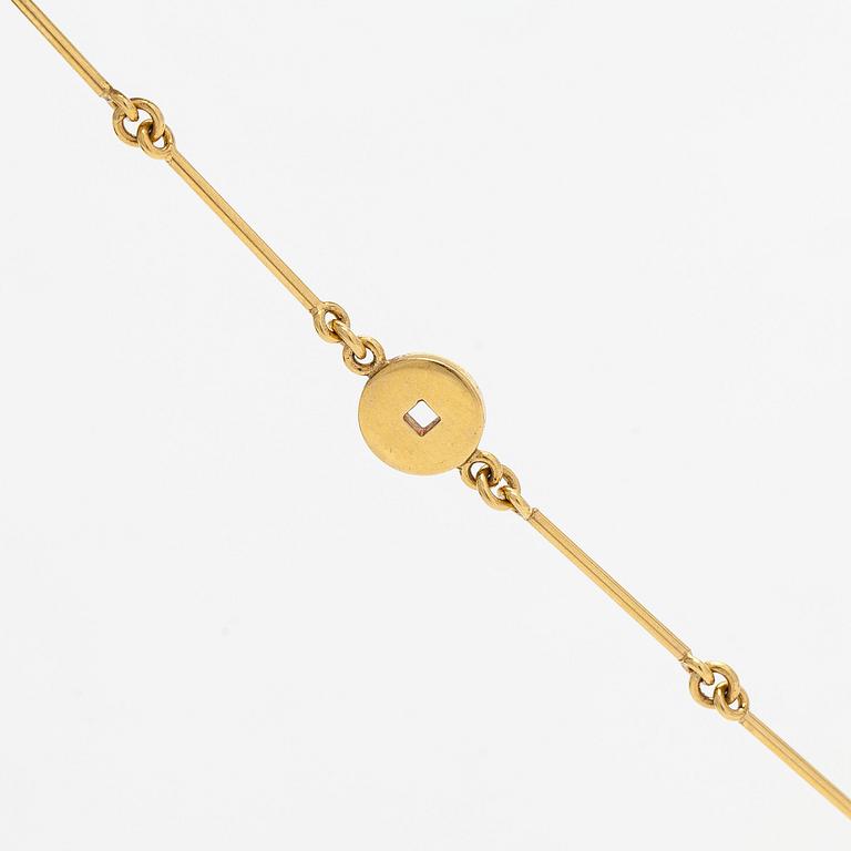 Pendant, faceted sapphires, rubies and diamonds, iron ore, 18K gold and white gold.