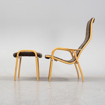 A 'Lamino' easy chair and stool by Yngve Ekström for Swedese, designed 1957.