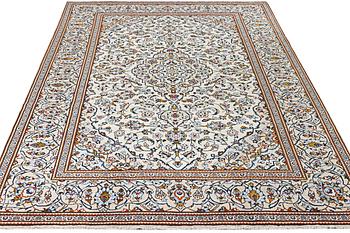 A Kashan carpet, c. 355 x 238 cm.