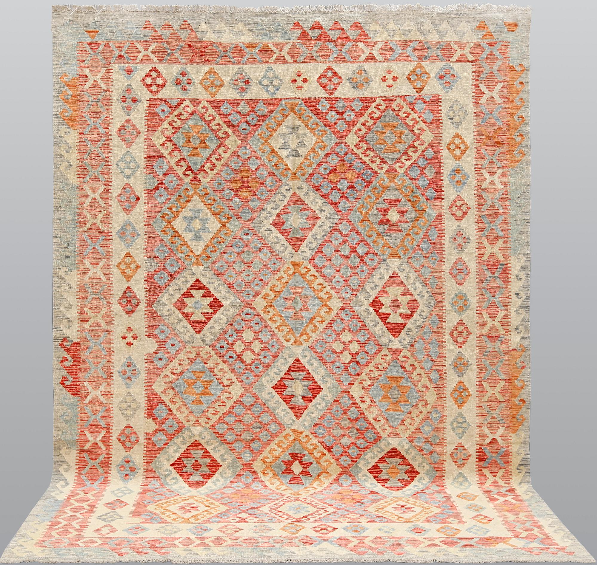 A carpet Kilim, ca 290 x 214 cm.