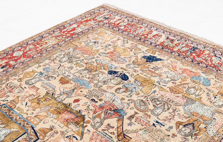 A signed semi-antique pictoral part silk Qum carpet, c. 341 x 224 cm.