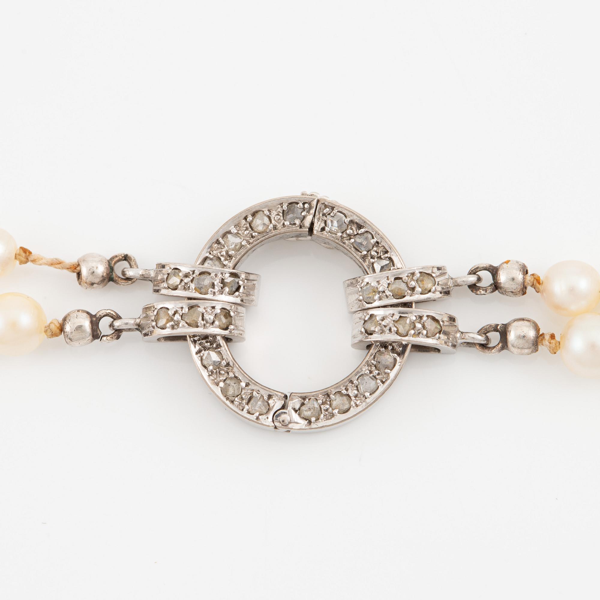 Pearl necklace, double-stranded, cultured pearls, clasp in white gold set with rose-cut diamonds.