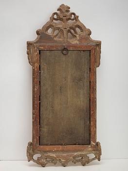 A Gustavian 18th century mirror by J Åkerblad, master 1758.