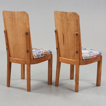 Axel Einar Hjorth, A pair of Axel Einar Hjorth 'Lovö' stained pine chairs, Nordiska Kompaniet, Sweden 1930's.