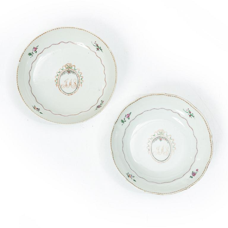 Cups and saucers, 11+7, and a teapot in famille rose with monogram, company porcelain, China, 18th century.