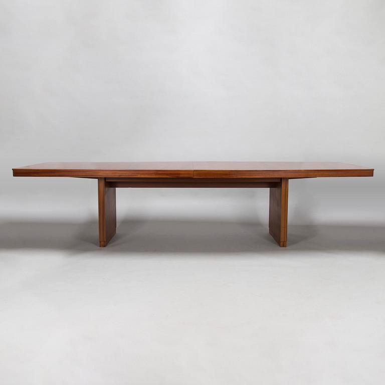A mid 20th century conference table / dinner table marked Paul Boman.