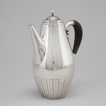 A three piece sterling silver coffee service "Cosmos" design Johan Rohde for Georg Jensen, Copenhage.