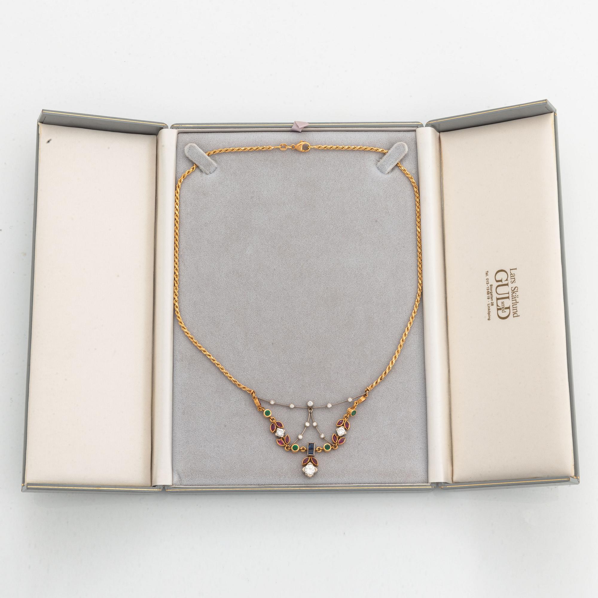 diamond, rubies, and emerald and sapphire necklace.
