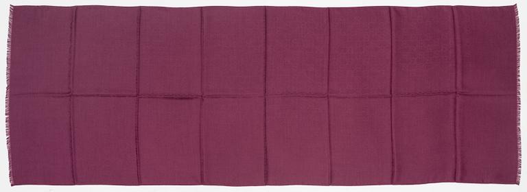 Gucci, a wool and silk mix "GG" jaquard shawl.