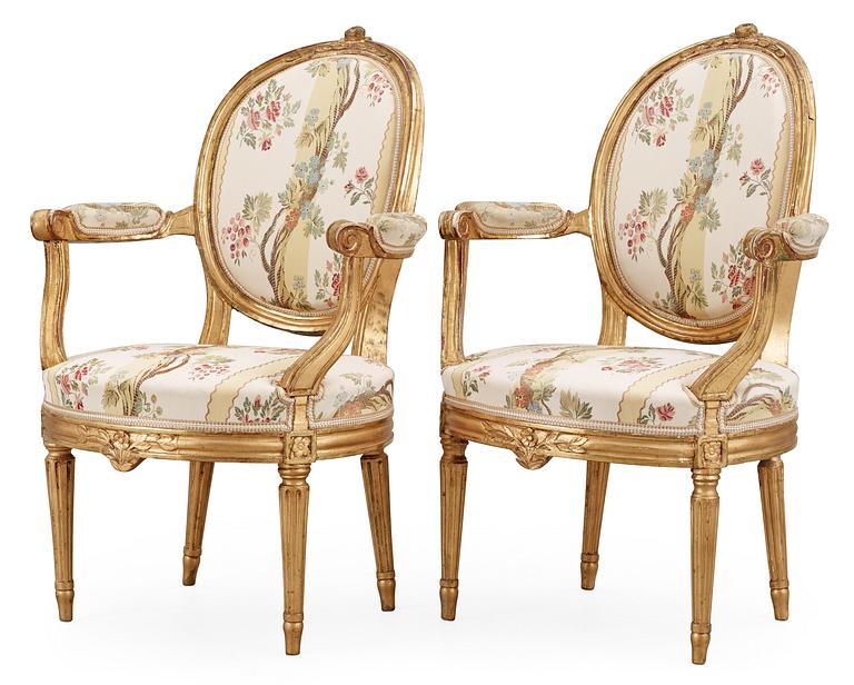 A pair of Gustavian late 18th Century armchairs.