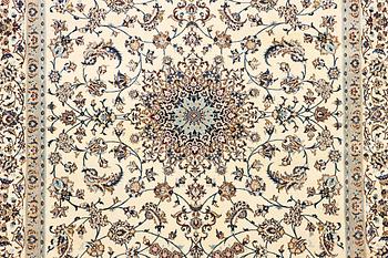 A part silk Nain carpet, 9 LA, a. 398 x 289 cm.