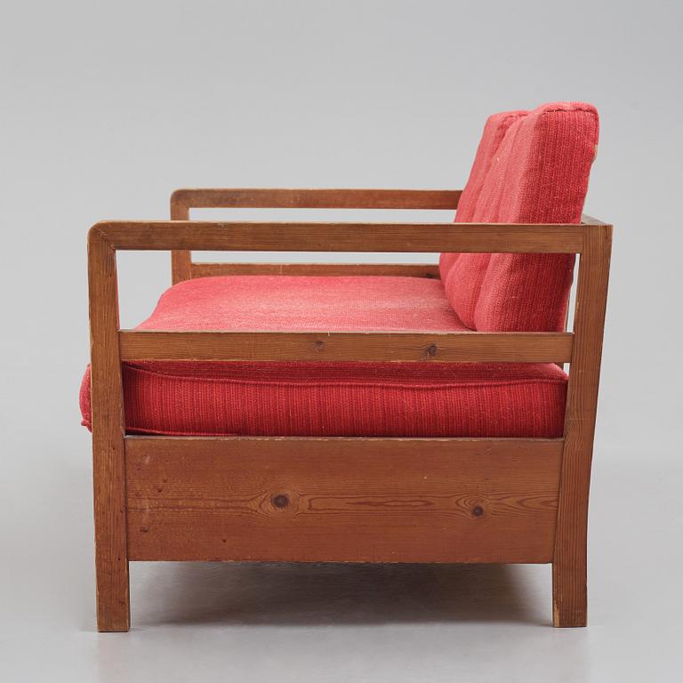 Axel Einar Hjorth, a stained pine sofa 'Sport', Nordiska Kompaniet Sweden, late 1930s.