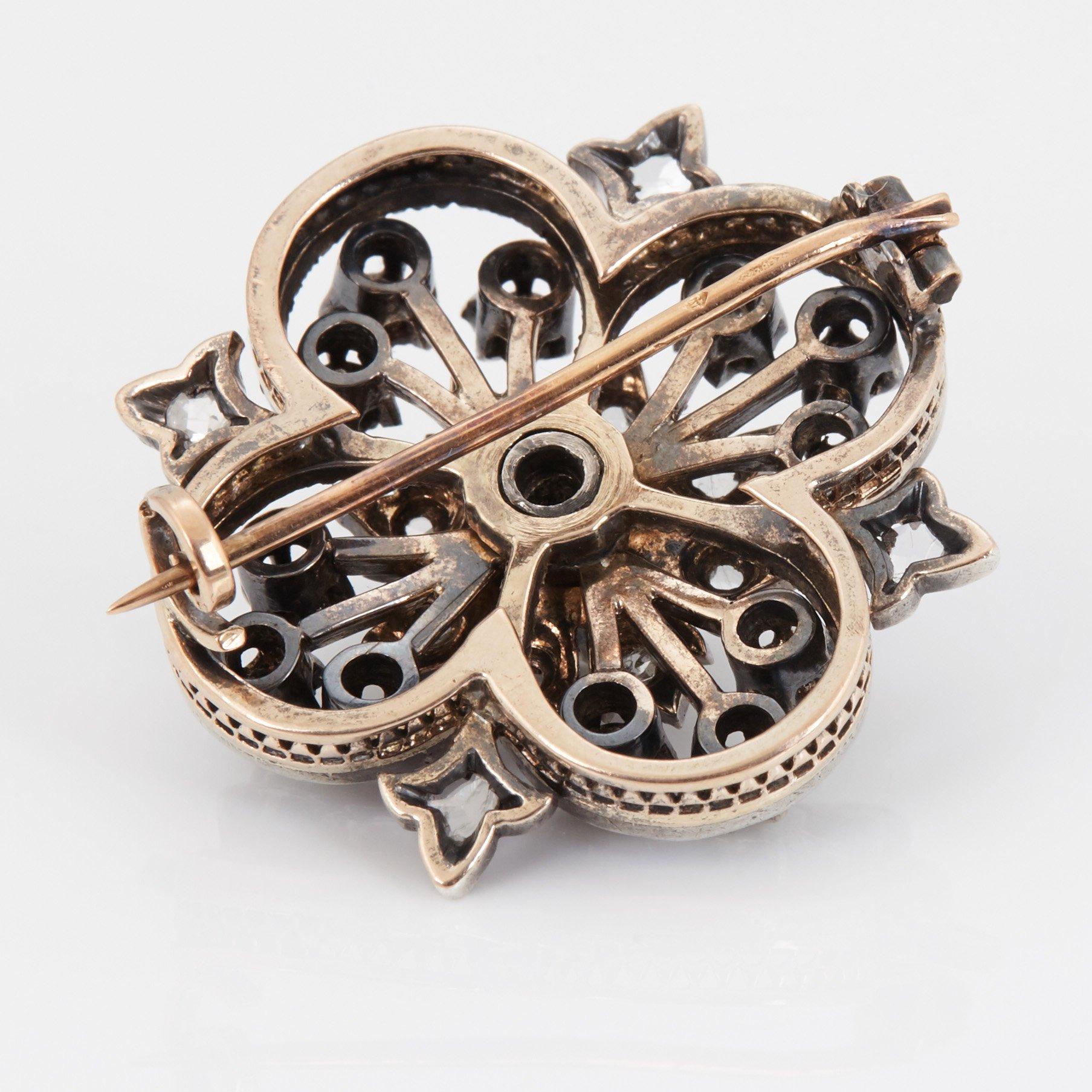 A BROOCH.