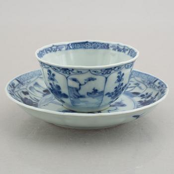 Three (a pair + one) blue and white cups with saucers, China, Kangxi (1662-1722).