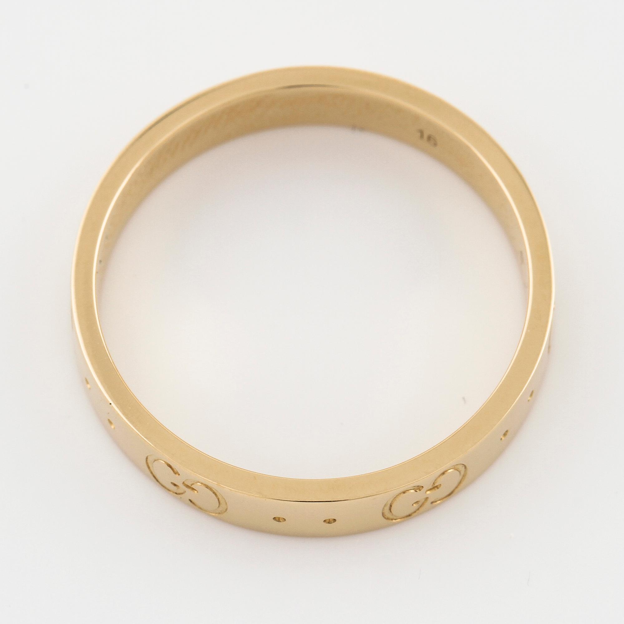 GUCCI, a "Gucci Icon" ring.