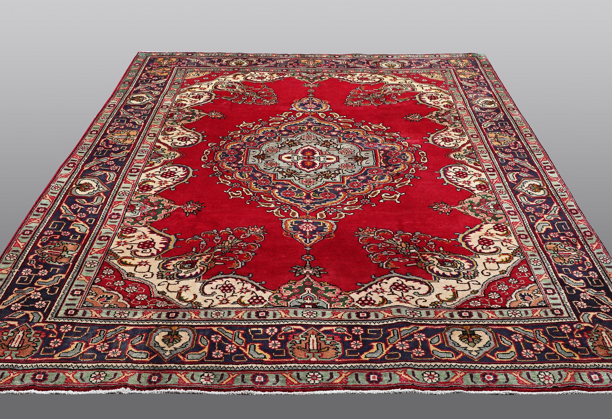 A carpet, Täbriz, 322 x 247 cm.