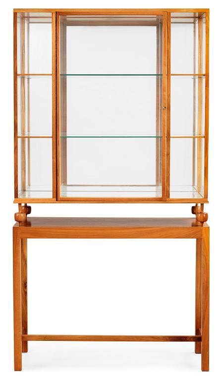 A Josef Frank cherrywood showcase cabinet, Svenskt Tenn, model 2077.
