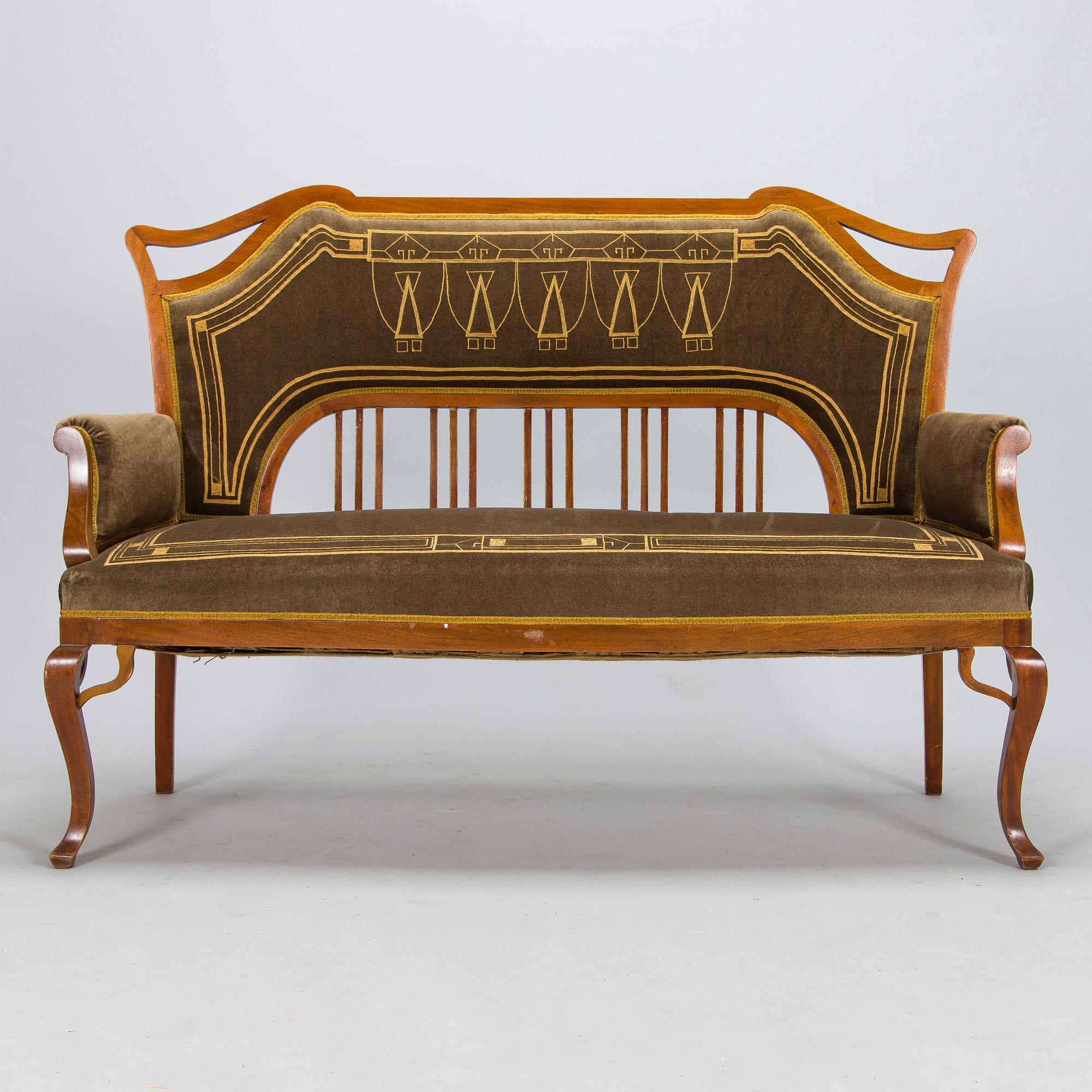An eight piece Art Nouveau lounge suite in mahogany, Belgium/Netherlands, early 20th century.