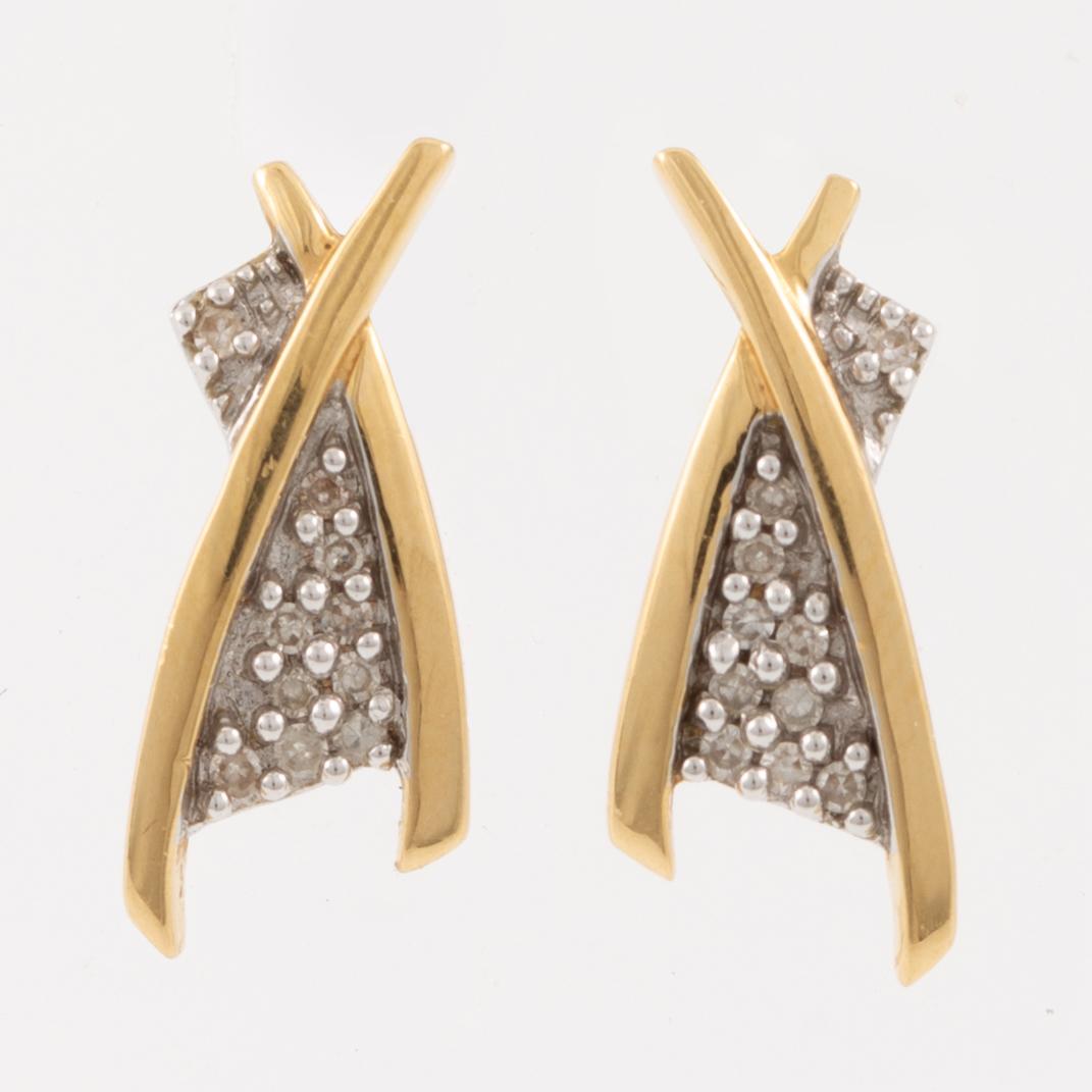 Earrings, 18K gold with small diamonds.
