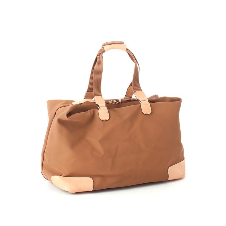 LANCEL, a treated canvas and leather weekend bag.
