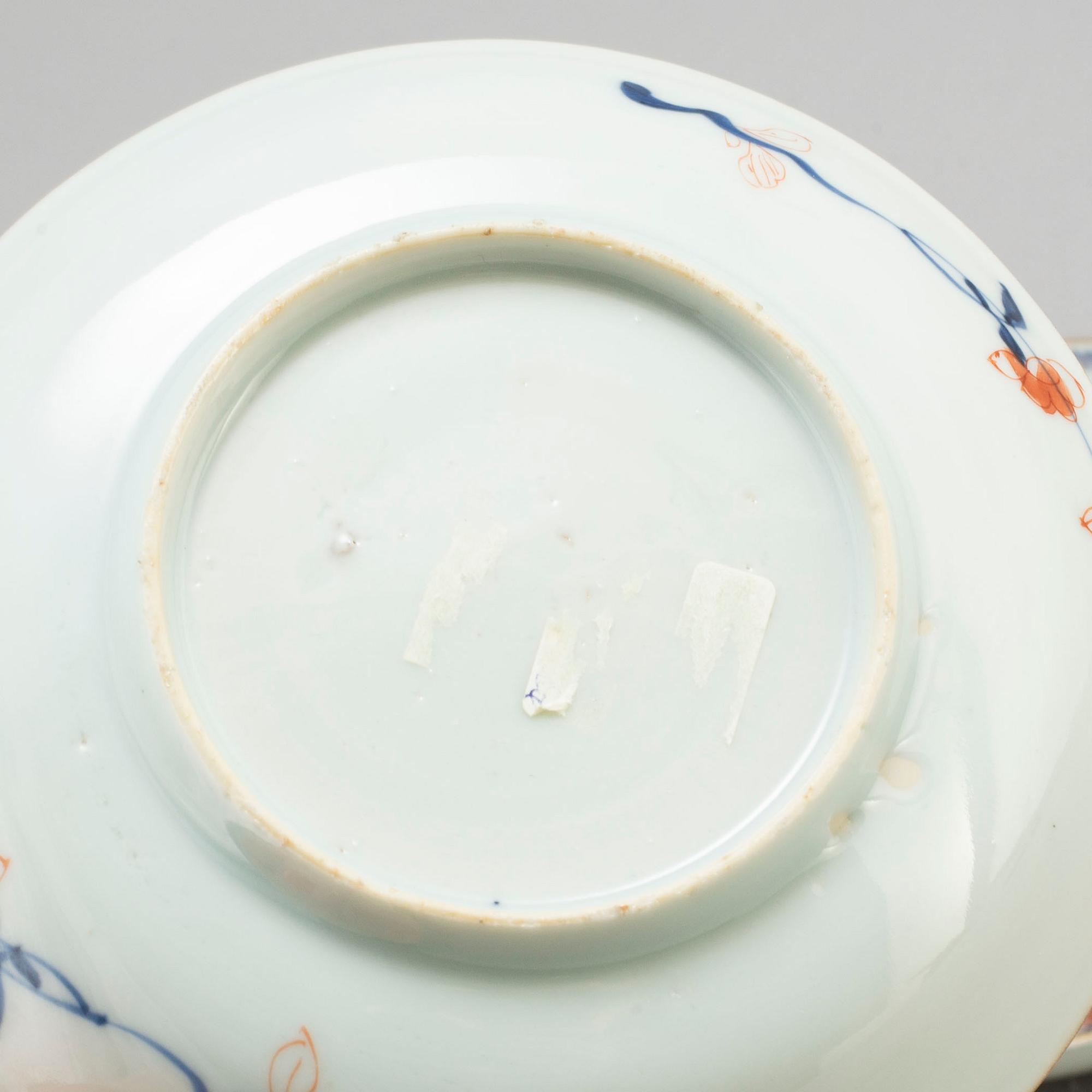 Three imari cups with saucers and two plates, Qing dynasty, Qianlong (1736-95).