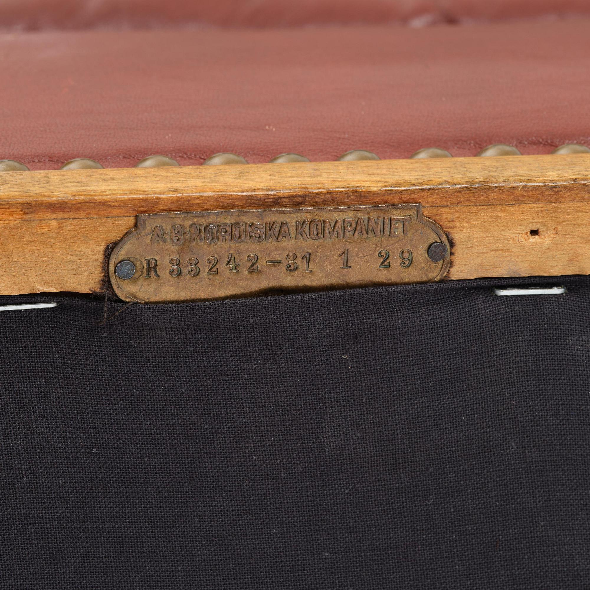 Axel Einar Hjorth, a "Caesar" stained birch and leather armchair, Nordiska Kompaniet, Sweden, 1929.