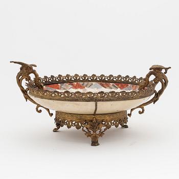 A Japanese Satsuma ware dish mounted as a centerpiece. Meiji (1868-1912).