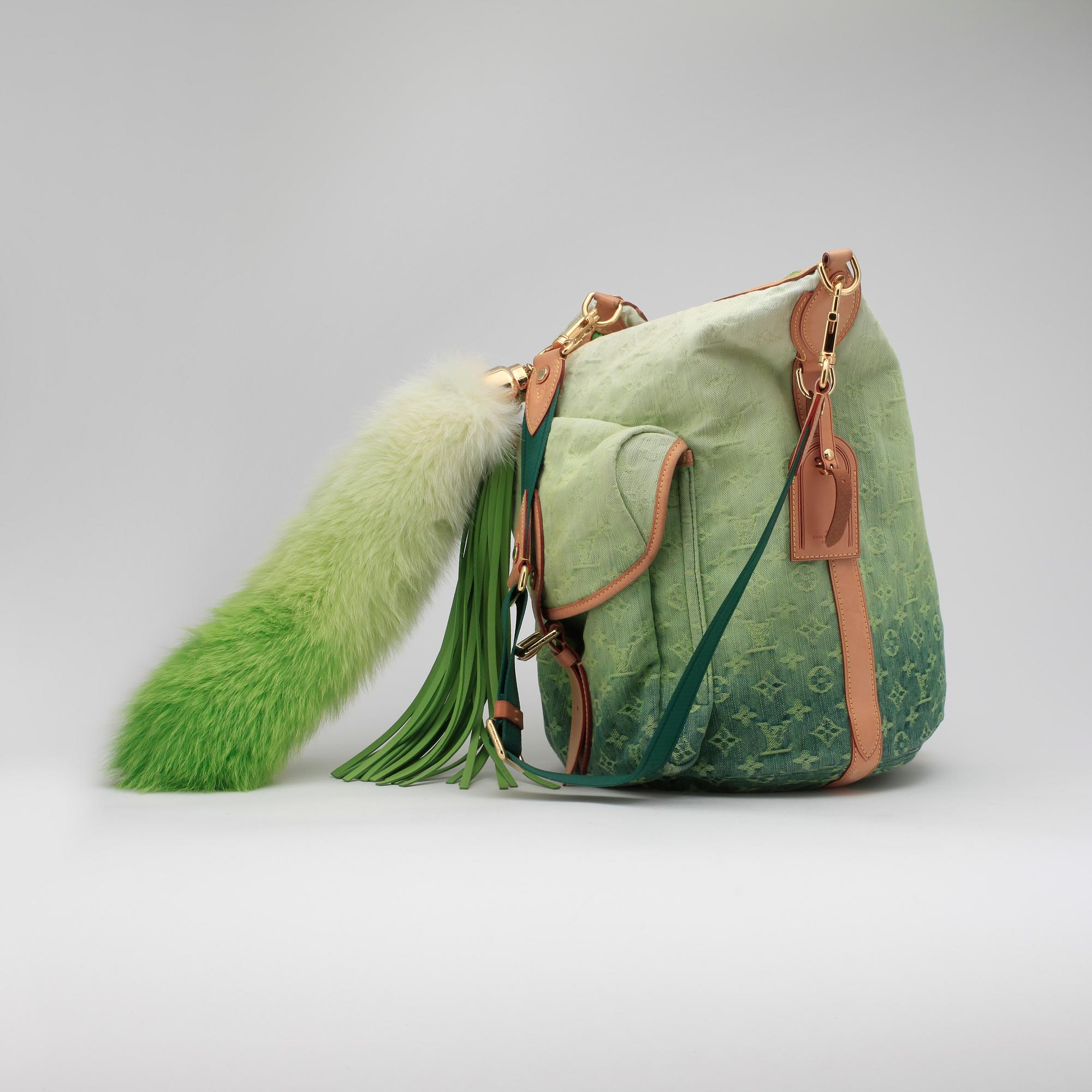 LOUIS VUITTON a Monogram Denim Sunburst PM shoulder bag spring summer 2010. Bukowskis