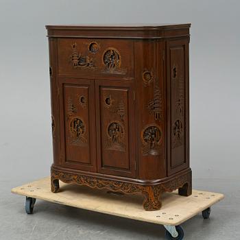 A Chinese wooden bar cabinet, 20th century.