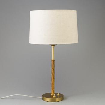 A mid 20th century table lamp by NK.