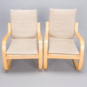 ALVAR AALTO, Pair of model '406' armchairs for Artek, late 20th century .