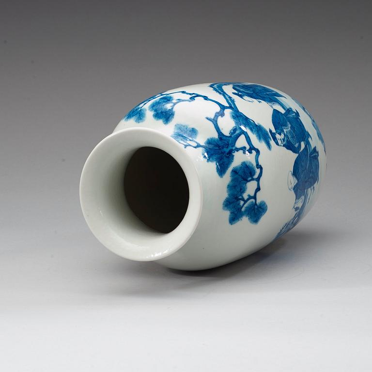 A blue and withe vase, 20th Century with Kangxi six character mark.