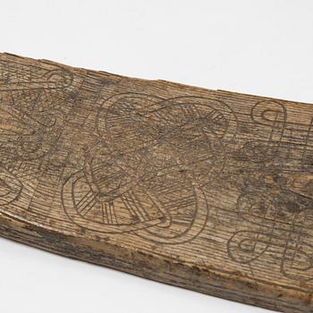 A Swedish folk art mangle board, dated 1666.