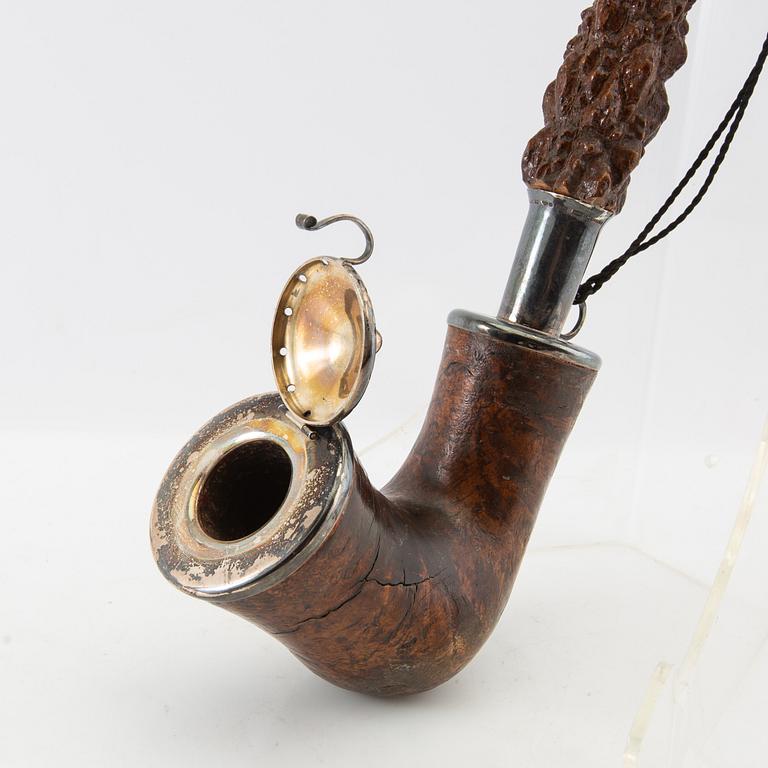 Long pipe  Carved wood with a silver mount Hasa Malmö 1986.