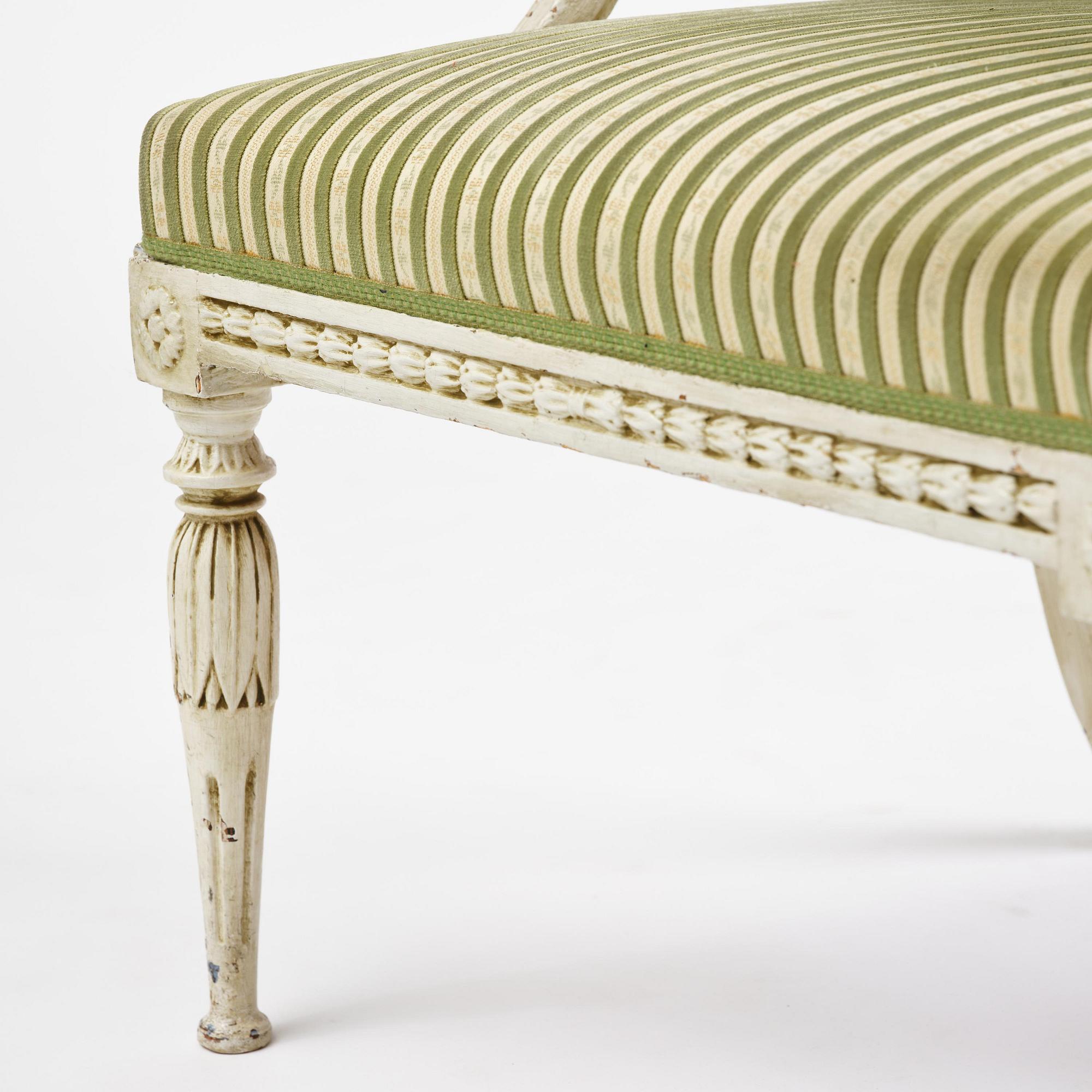 A late Gustavian open back armchair, Stockholm, late 18th century.