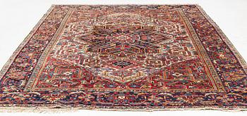 A semi antique Heris carpet, c. 345 x 255 cm.