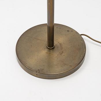 A brass floor lamp, mid 20th Century.