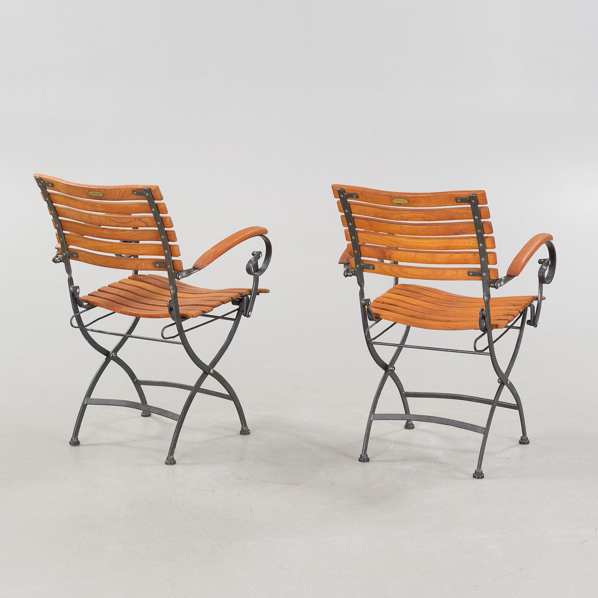 A garden table and four garden chairs from Covent Garden, 21th century.