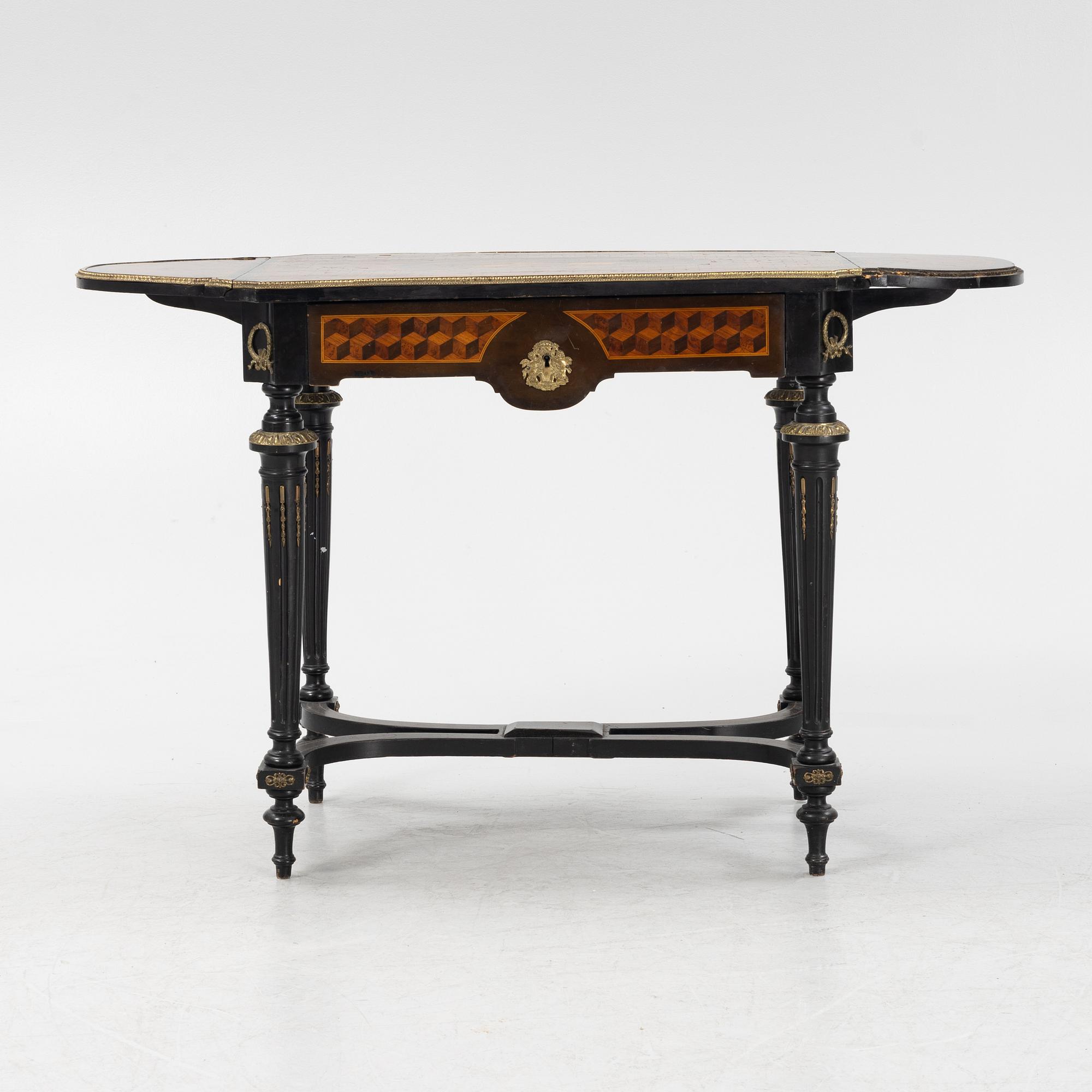 A Louis XVI style table, second half of the 19th century.