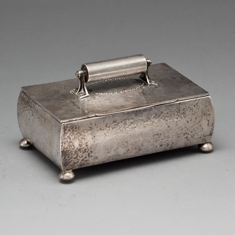 SKRIN, silver. Bl a Erlandssons silvervarufabrik, Kristianstad 1920. Tot vikt ca 1300 g.