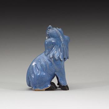 A blue glazed figure of a buddhist lion, Qing dynasty, Qianlong (1736-95).