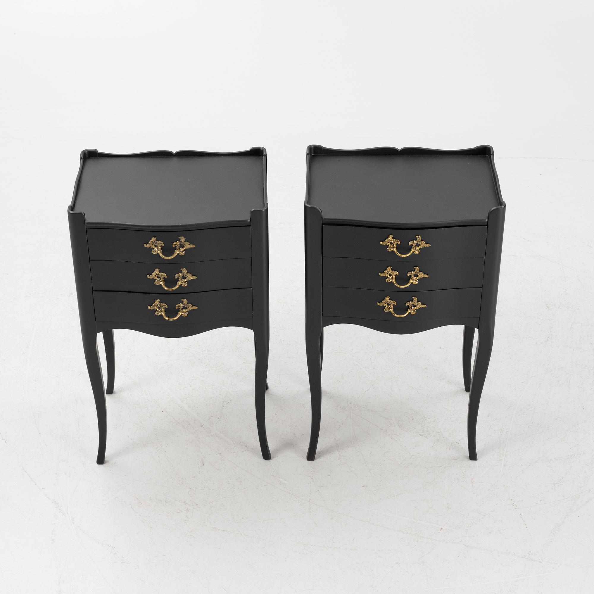 A pair of Rococo style bedside tables, second half of the 20th Century.