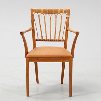 A model 1165 armchair by Josef Frank for Firma Svenskt Tenn.