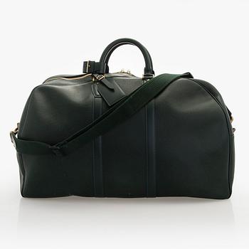 Louis Vuitton, a Taiga leather 'Kendall GM' weekend bag.