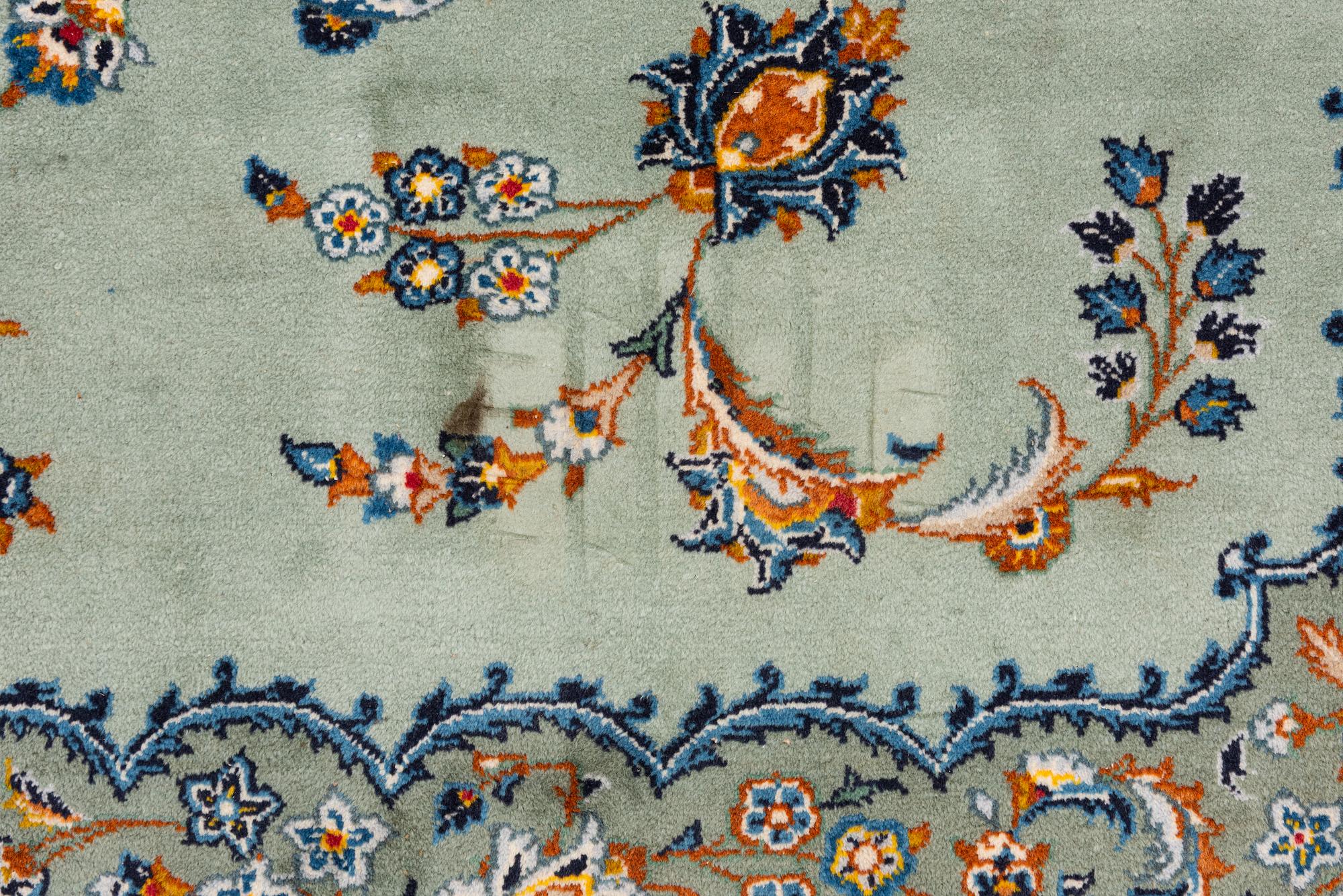 A Keshan carpet, signed, c. 376 x 270 cm.