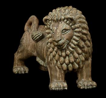 A Gunnar Nylund stoneware figure of a lion, Rörstrand.