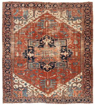 393. An antique Heriz carpet, ca 350 x 317 cm.